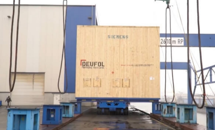 Deufol packing a 251-ton Siemens compressor for sea freight