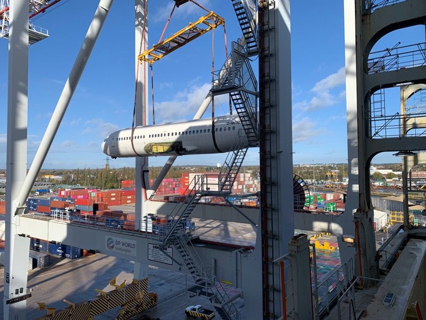 A 737 boards a CMA CGM container ship