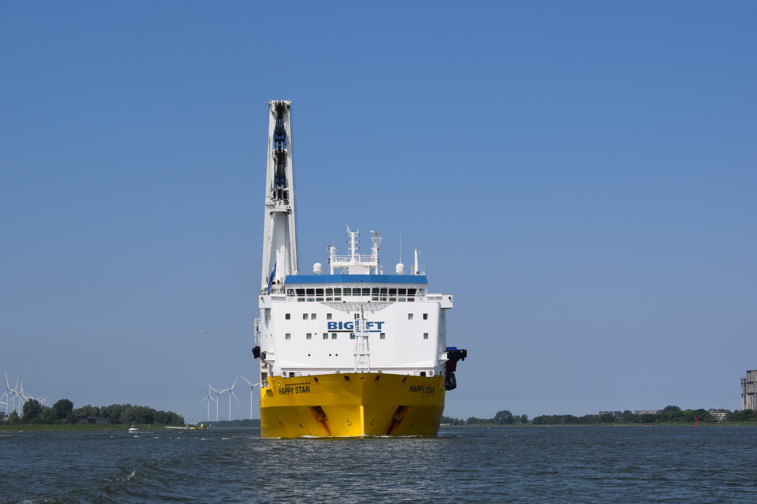 BigLift's Happy Star sails into Rotterdam with ten Damen tugs on board