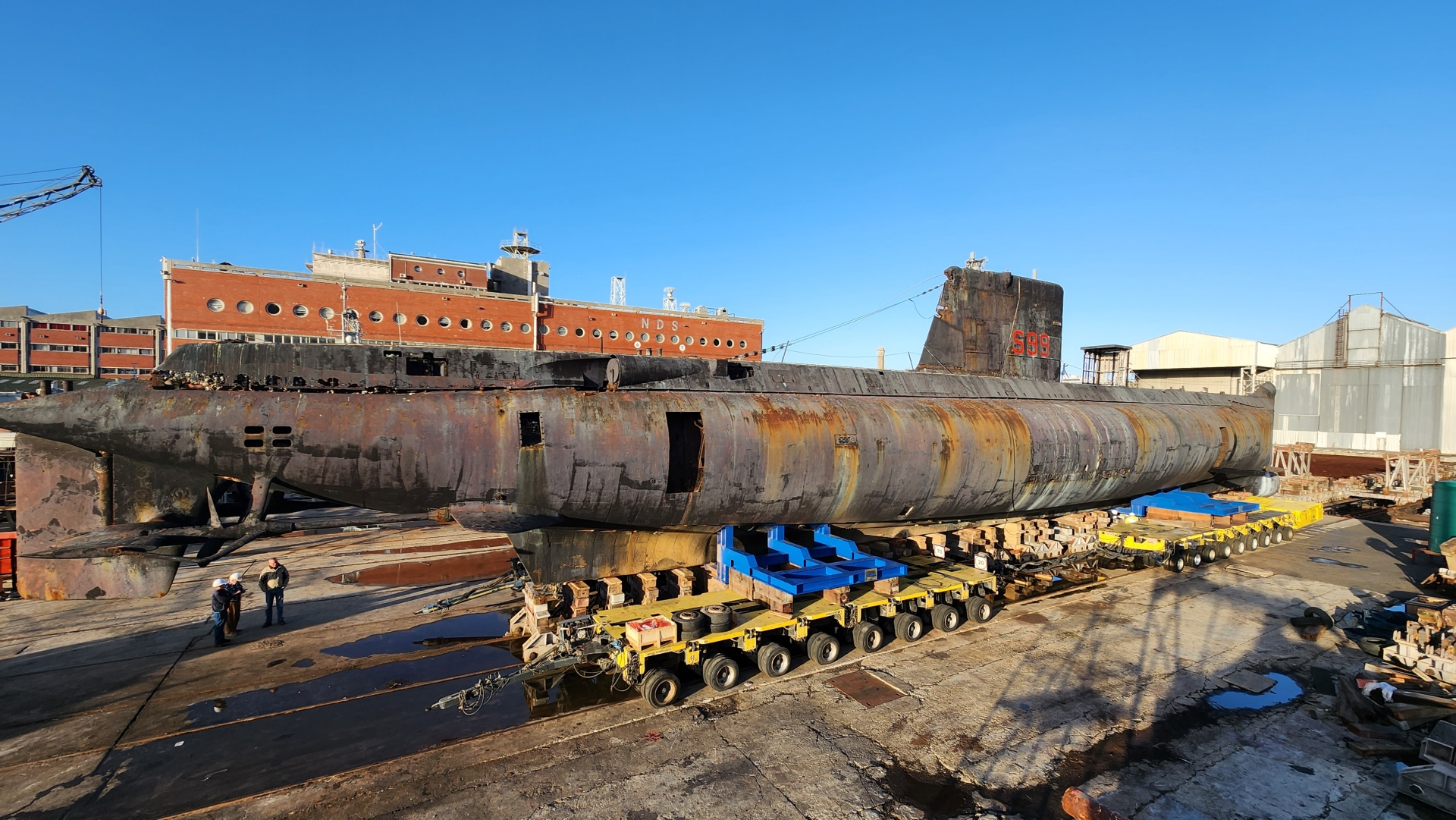 Ex-South African Navy submarine relocated in adverse weather