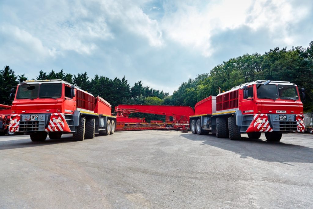 Allelys, a heavy haulage and project cargo handling specialist, has continued to scale up its equipment fleet as it keeps pace with the increased demands within the UK market. The company has recently completed a purchase of multiple girder frame trailers, a range of modular axles and various heavy ballast trucks, including the UK-designed and built Trojan trucks. The first phase of equipment has already joined the existing fleet, with the remainder joining within the coming months. “Allelys have been a dominant force within the UK transport and heavy lift market for a number of years now and this investment cements our position as the number one heavy lift and specialist transport provider in the UK,” commented Richard Beardmore, Chief Commercial Officer at Allelys. “We’re excited for the new equipment to join our existing fleet and for our client base to experience the added value that this will provide. With both our capability and capacity increased, our service offering continues to expand, which will only have a positive impact for our clients.” Allelys is playing a major role in supporting the UK's transition to a greener energy future. The company's fleet of girder frame trailers is being utilized to transport and install critical infrastructure for renewable energy projects. Allelys boosts specialised heavy transport fleet