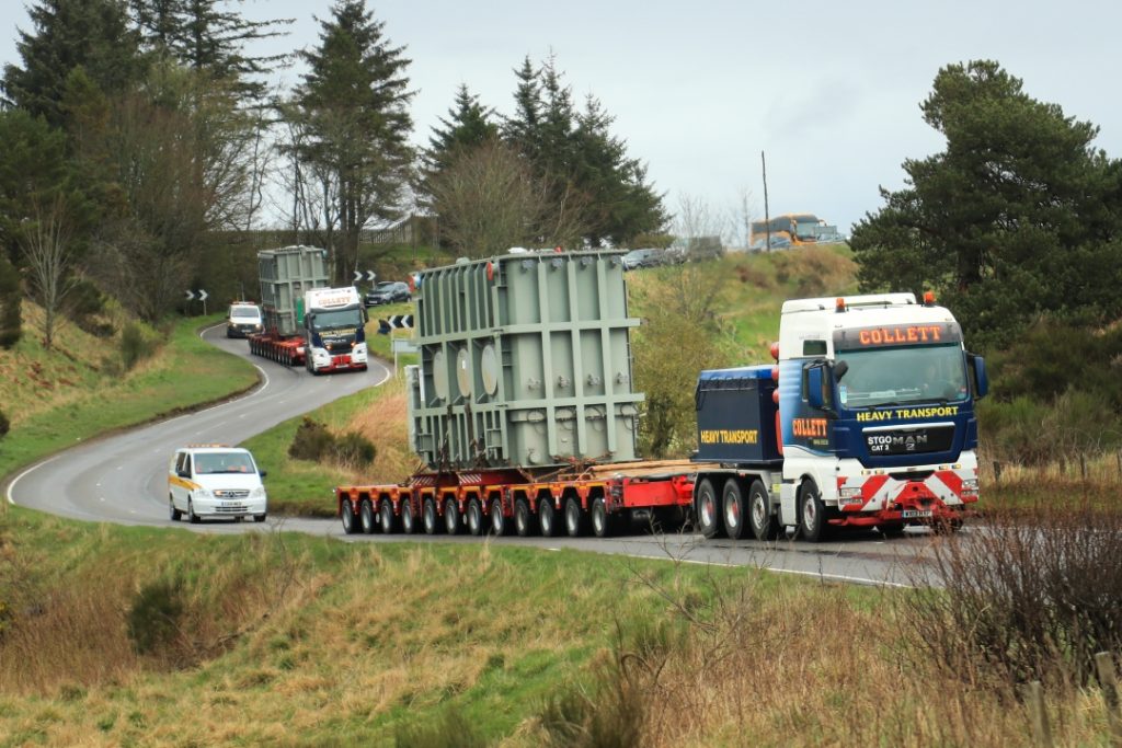 Four transformers taken on a trip across Scottish countryside