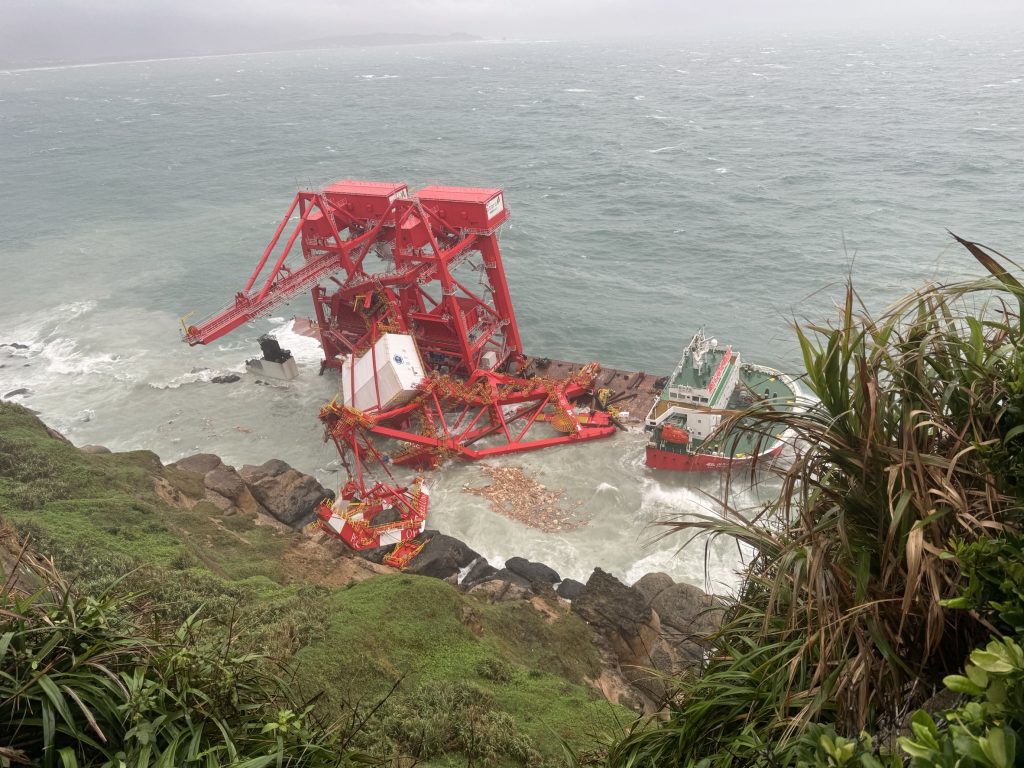 Heavy transport vessel runs aground battered by typhoon off Taiwan